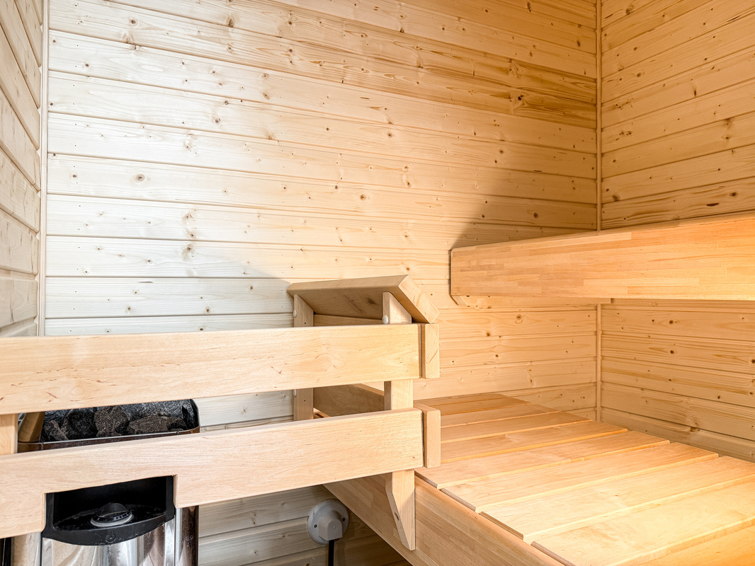 Kylpyhuoneen kruunaa oma sauna!