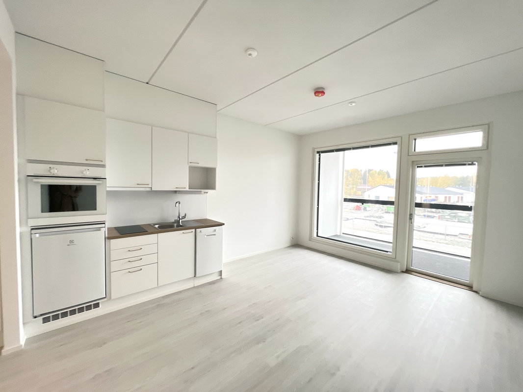 Huone ja avokeittiö