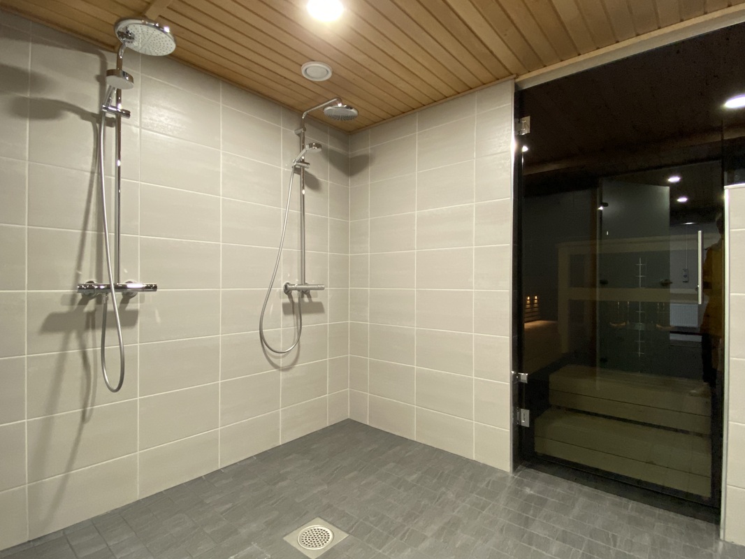 Taloyhtiön sauna/kylpyhuone