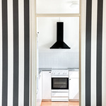 Ylimmän kerroksen tyylikkäästi remontoitu koti.