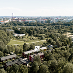 Vehreä puutaloalue Kumpulassa