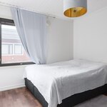 Suurempi makuuhuoneista