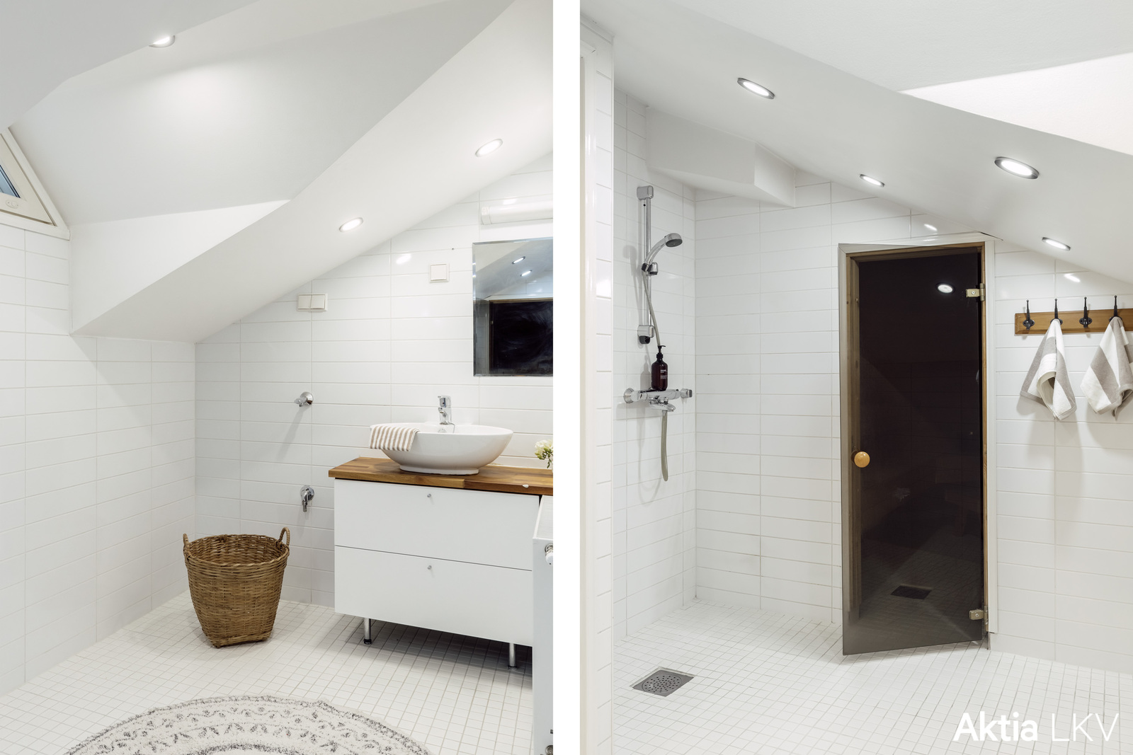 Kylpyhuone, suihkutila ja saunaa menevä ovi.
