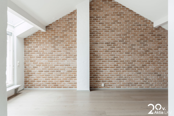 Olohuoneen upea punatiiliseinä